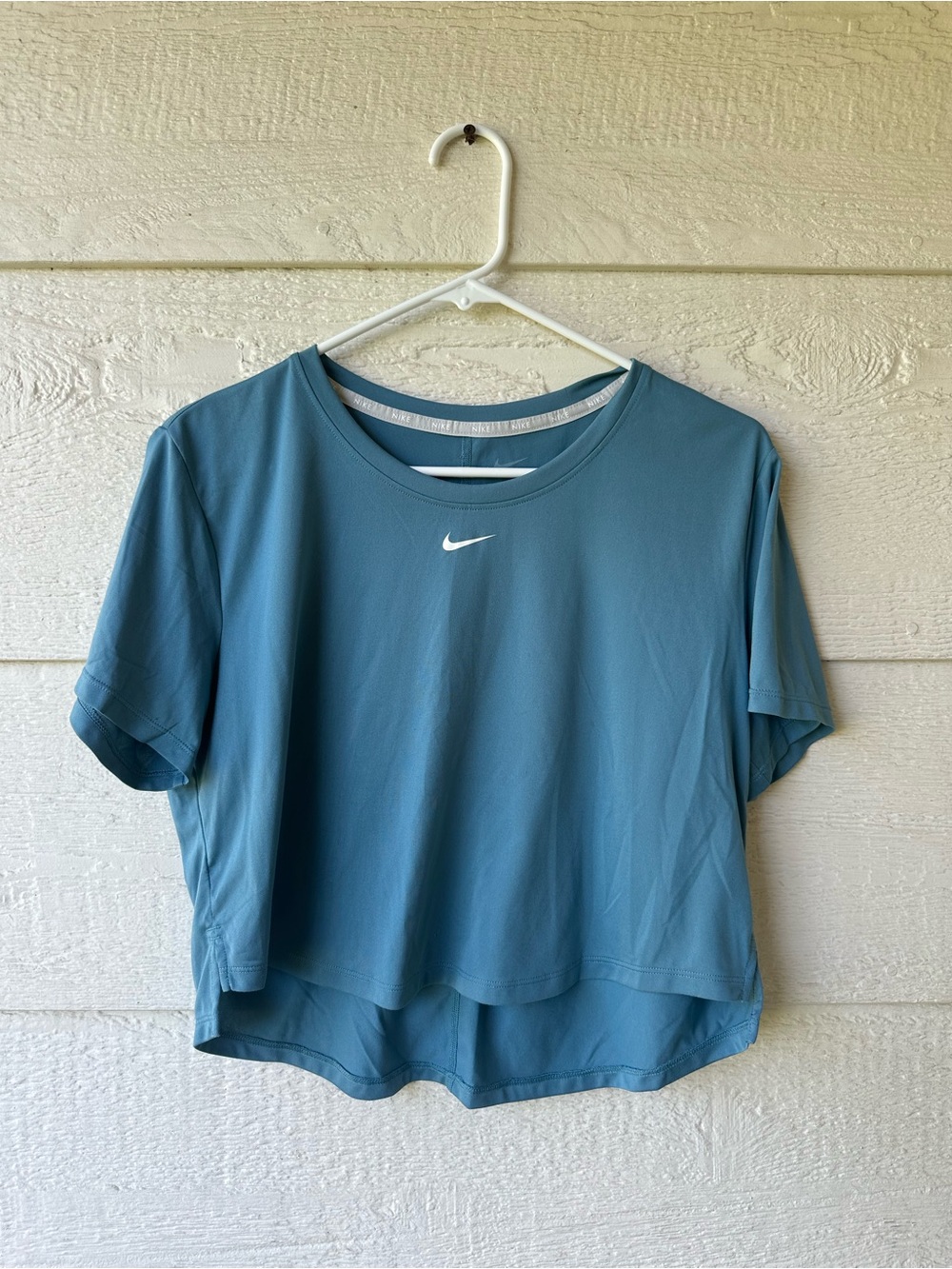 Blue Nike athletic top
